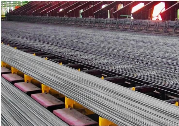 Rebar lying across a long cooling bed